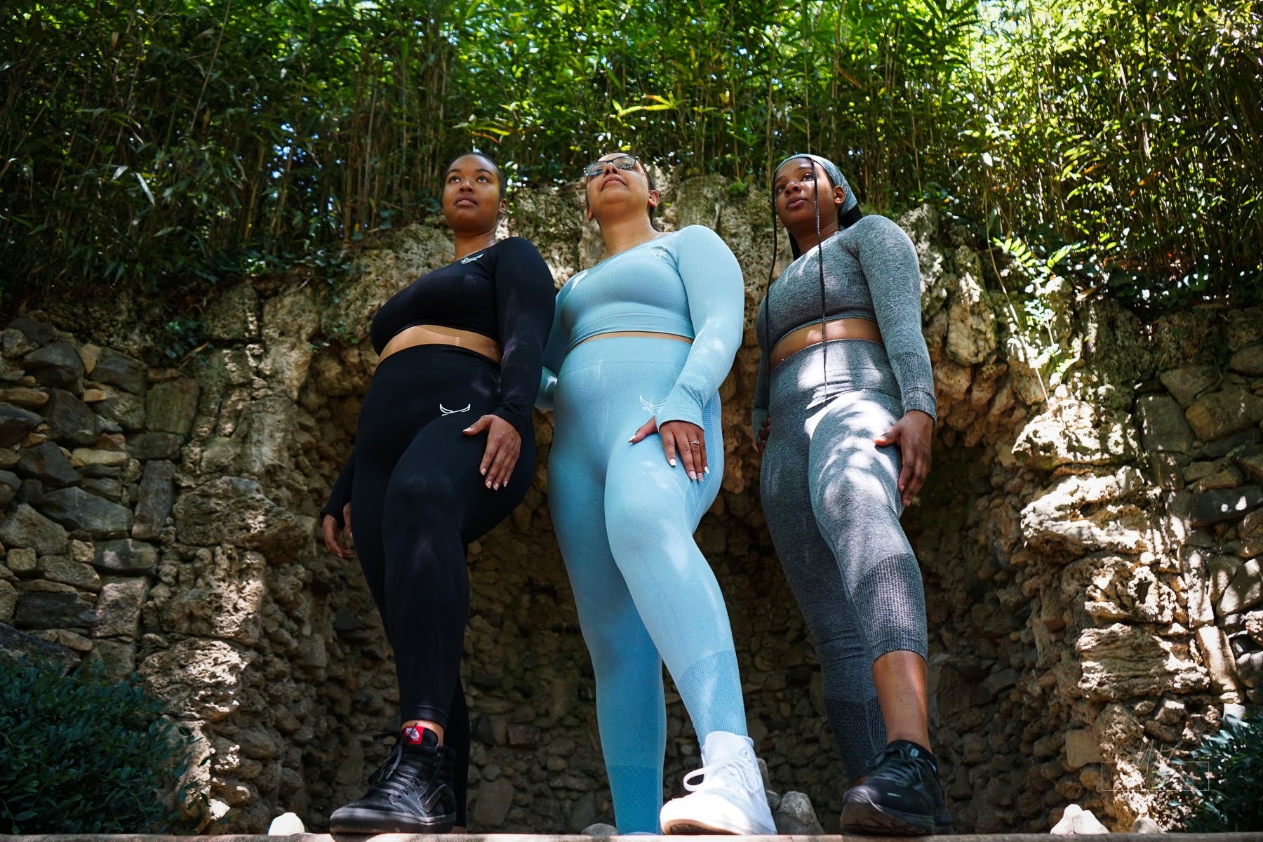 Tall women in their Empower sets standing and looking forward.